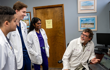 Medical students at KCU meeting with Dr. King